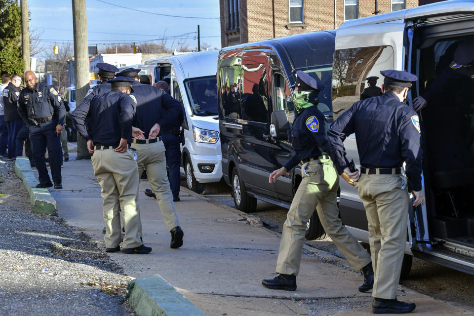 FILE - Baltimore Police cadets arrive to the neighborhood around Pennington Avenue following an overnight shooting of a Baltimore Police officer, Thursday, Dec. 16, 2021. (Jerry Jackson/The Baltimore Sun via AP, File)