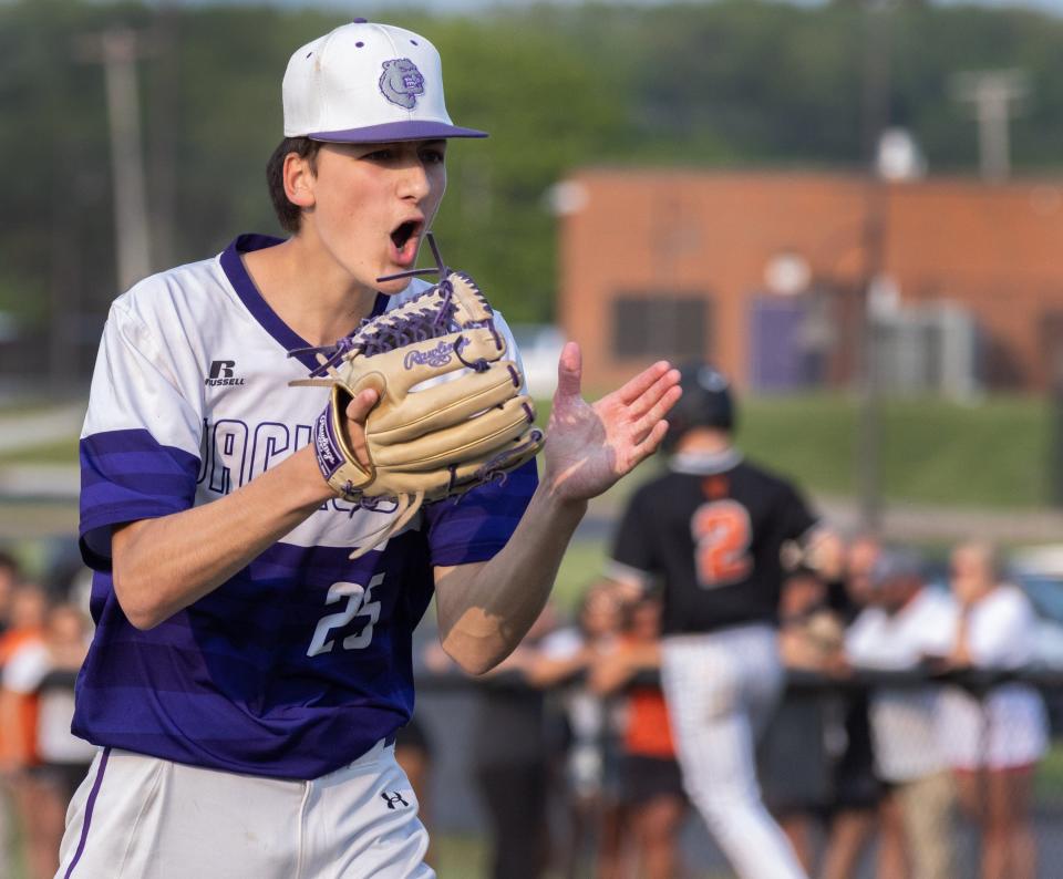 Jackson relief pitcher Landon Thiel celebrates defeating Hoover 8-0 in a Division I sectional final, Thursday, May 18, 2023.