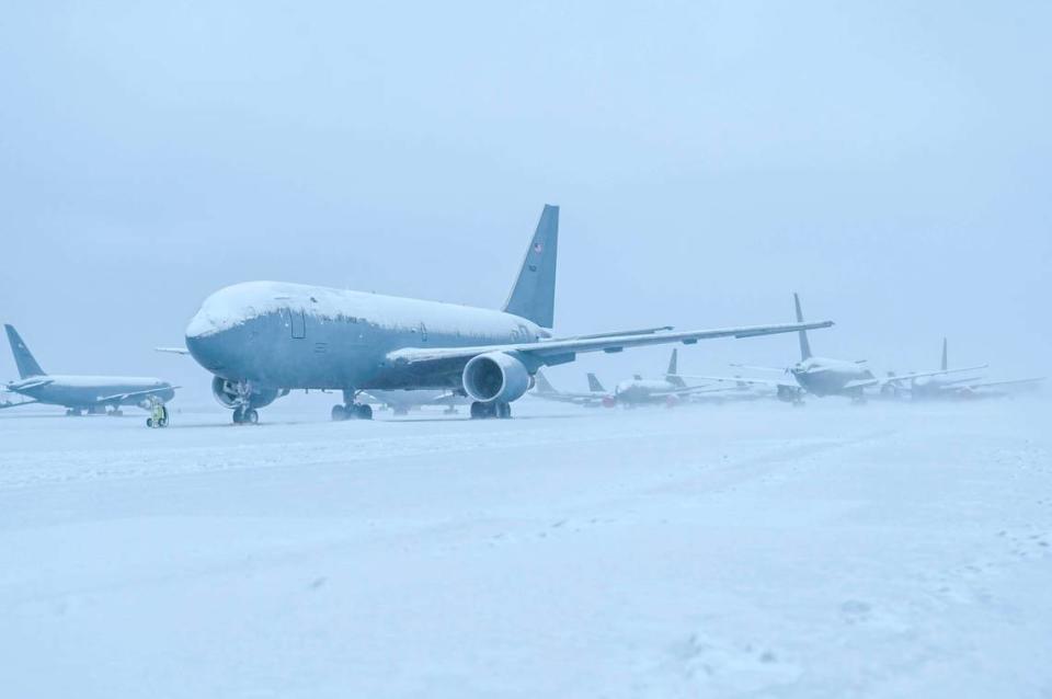 KC-46 and KC-135 tankers on the flight line at McConnell Air Force Base on Tuesday morning. Airmen worked to clear snow from the runway and ramp to continue supporting off-station flying operations.