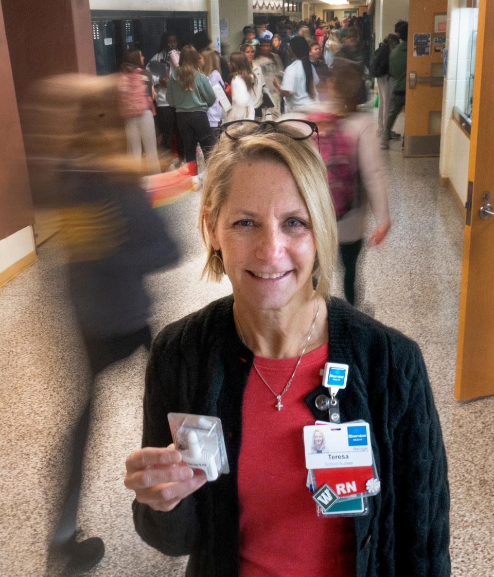 Westfield Schools’ School Nurse Manager Teresa Layton, RN, shows a Narcan kit Wednesday, Dec. 6, 2023 at Westfield Middle School. Layton, with Riverview Health, coordinates nursing services at the schools. Narcan, for use to reverse an opioid overdose, is stocked for 5th through 12 grades in the schools for use if needed. But protocol is in place to treat anyone in all the schools. It has never been used on the Westfield campuses, Layton says, but it is just another tool so they can provide emergency services if needed.