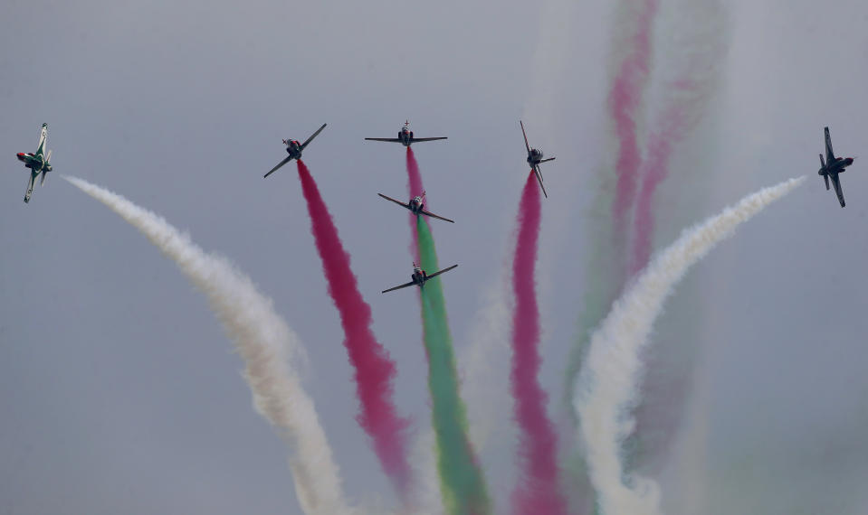 Pakistani planes flyover during a military parade celebrating Pakistan National Day celebrations, in Islamabad, Pakistan, Thursday, March 25, 2021. The military parade in the capital showcased short and long-range missiles, tanks, jets drones and other hardware. (AP Photo/Anjum Naveed)