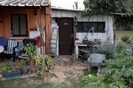 Damage to the entrance of a shed, caused by a rocket fired from the Gaza Strip, is seen in a Kibbutz on the Israeli side of the Israeli-Gaza border, May 30, 2018 REUTERS/Amir Cohen