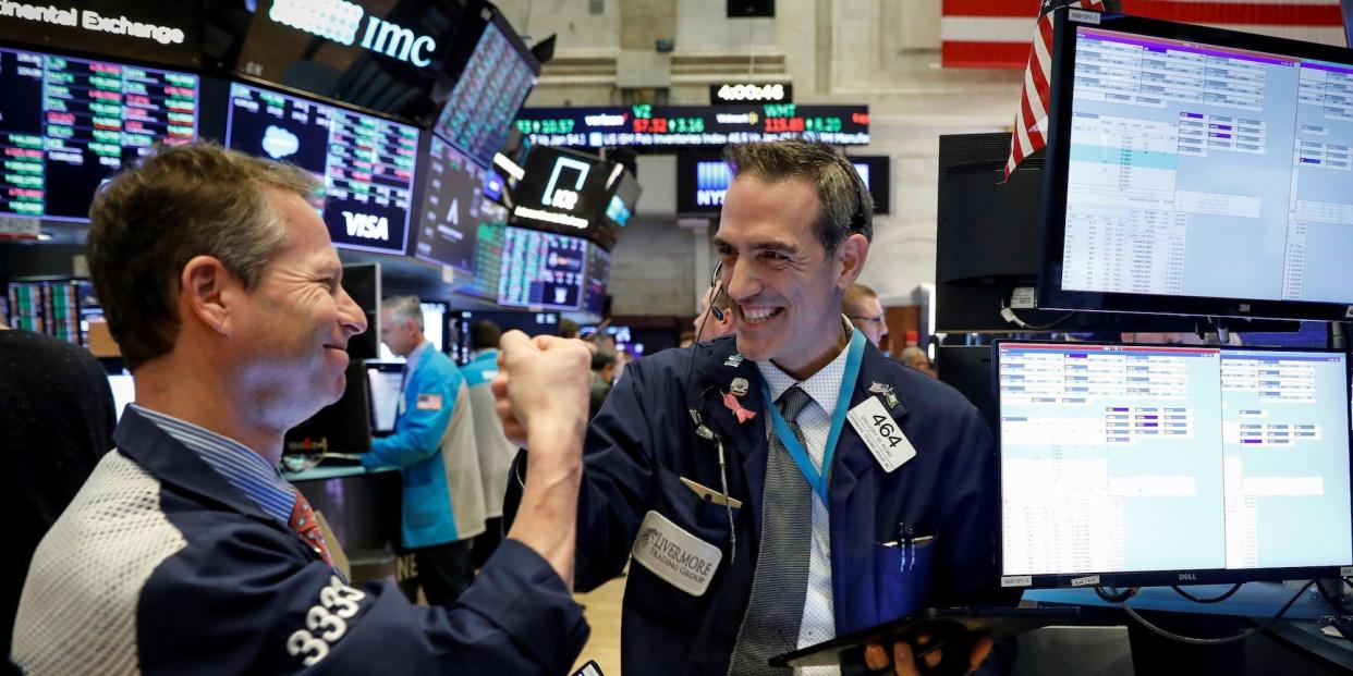 trader nyse celebrate happy fist bump