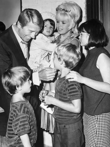 <p>Bettmann</p> Mickey Hargitay, Jayne Mansfield, and kids Zoltan, Miklos, Mariska and Jayne Marie