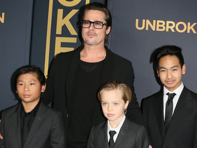 <p>JB Lacroix/WireImage</p> Brad Pitt; Pax Thien Jolie-Pitt, Shiloh Nouvel Jolie-Pitt and Maddox Jolie-Pitt attend the "Unbroken" Los Angeles premiere on December 15, 2014 in Hollywood, California.