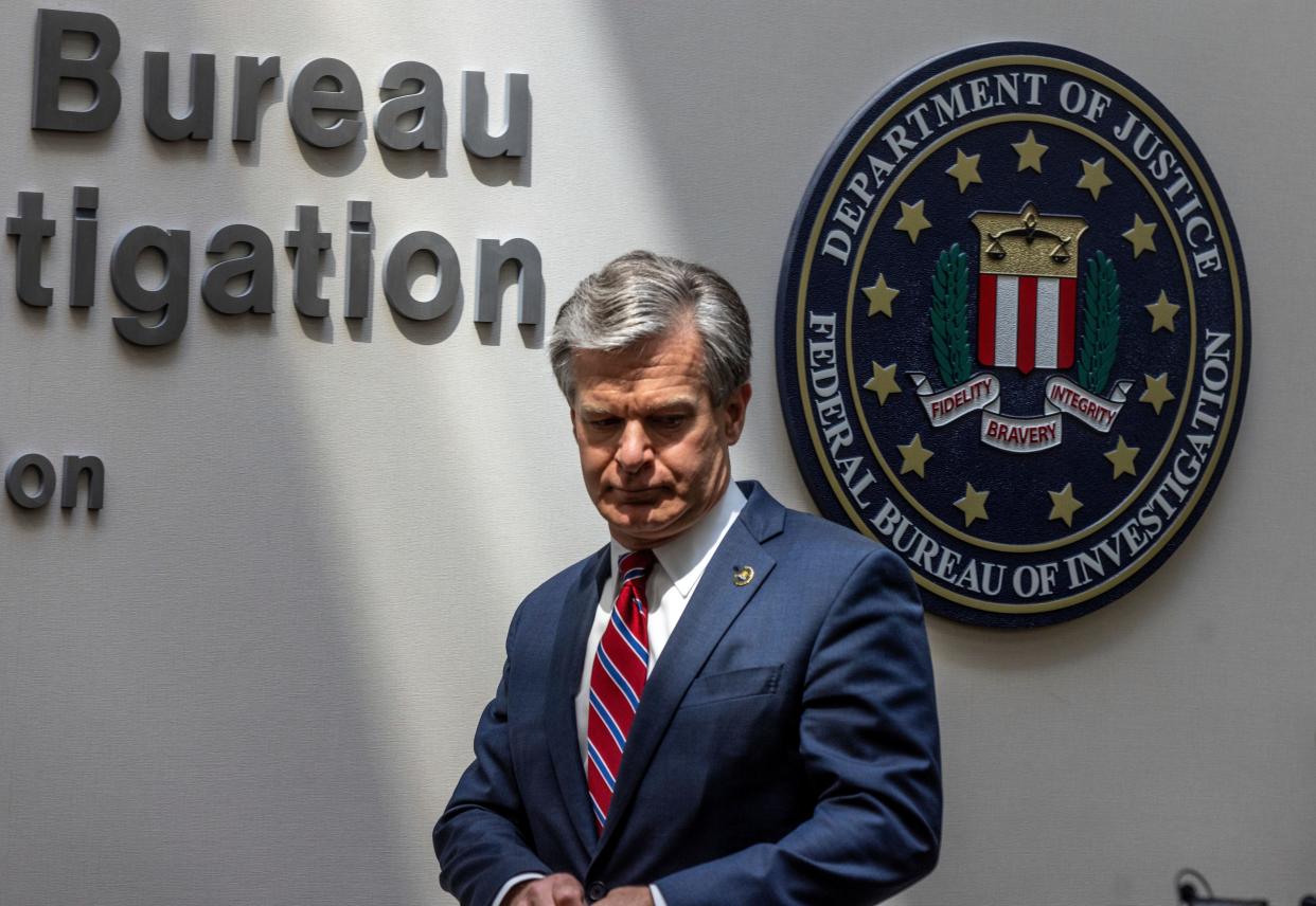 FBI Director Christopher Wray speaks to journalists at the Omaha FBI office on Aug. 10. Wray addressed threats made to law enforcement after agents raided Trump's Mar-a-Lago residence in Palm Beach, Fla.