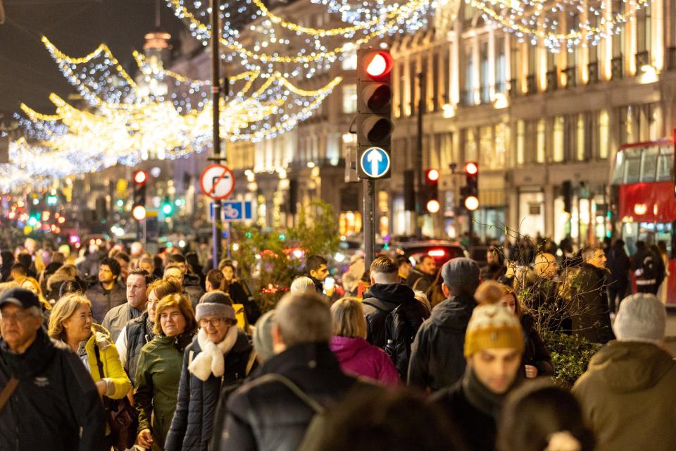 London, UK. Dec 1st 2022. Shoppers on Regent Street as Christmas theme arrived in London's West End with a host of festive window displays. Photo credit: Alamy Live News