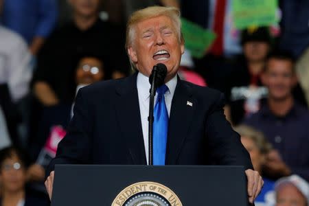 U.S. President Donald Trump holds a rally with supporters in an arena in Youngstown, Ohio, U.S. July 25, 2017. REUTERS/Jonathan Ernst