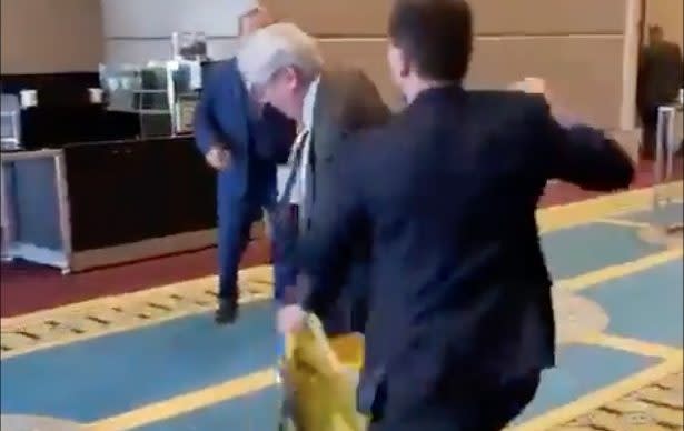A Ukrainian delegate took umbrage when Russian counterpart snatched away his flag