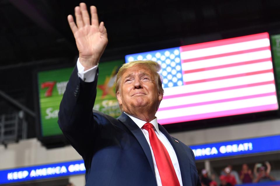 President Donald Trump waves to supporters as he arrives for a campaign rally in Rio Rancho, New Mexico, on Sept. 16, 2019.