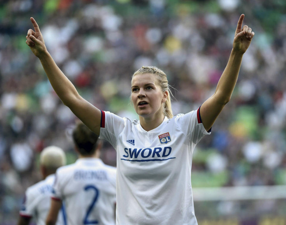 FILE - In this May 18, 2019, file photo, Lyon soccer player Ada Hegerberg, of Norway, celebrates her goal during the women's soccer UEFA Champions League final match against FC Barcelona, in Budapest, Hungary. The world’s best player won’t be at the Women’s World Cup but the world’s best team will be, with both sides taking a stand for equality. (Balazs Czagany/MTI via AP, File)