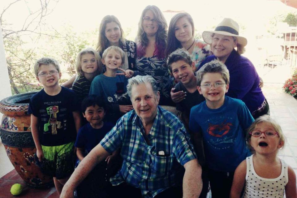 <p>Brian Wilson Facebook </p> Brian Wilson with his kids and grandchildren on Father
