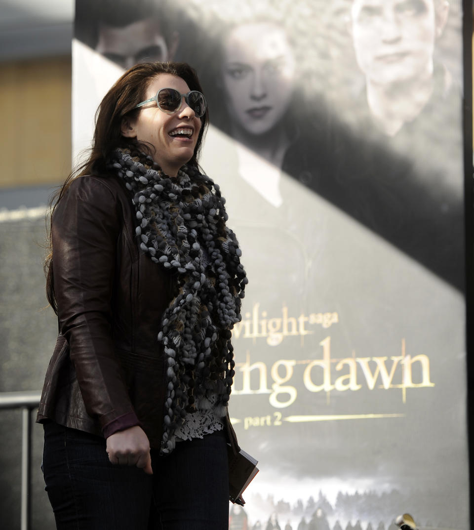 Stephanie Meyer, author of the series of "Twilight" novels, arrives onstage during the Twilight Fan Camp Concert outside Nokia Theater L.A. Live, Saturday, Nov. 10. 2012, in Los Angeles. The world premiere of the film "The Twilight Saga: Breaking Dawn - Part 2" will be held at Nokia Theater L.A. Live on Monday. (Photo by Chris Pizzello/Invision/AP)