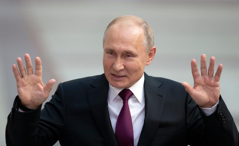 Russian President Vladimir Putin gestures answers a journalist's question after his annual call-in show in Moscow, Russia, Thursday, June 20, 2019. Putin hosts call-in shows every year, which typically provide a platform for ordinary Russians to appeal to the president on issues ranging from foreign policy to housing and utilities.