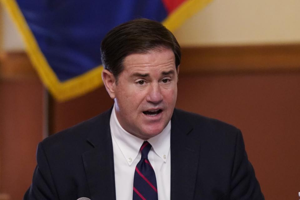 FILE - In this Nov. 30, 2020, file photo, Arizona Gov. Doug Ducey speaks at the Arizona Capitol in Phoenix. Gov. Ducey faces a deadline Tuesday, April 20, 2021, to sign or veto legislation revamping the state's sex education laws to make them some of the strictest in the nation when it comes to teaching about LGBTQ issues. (AP Photo/Ross D. Franklin, Pool, File)
