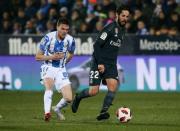 Soccer Football - Copa del Rey - Round of 16 - Second Leg - Leganes v Real Madrid - Butarque Municipal Stadium, Leganes, Spain - January 16, 2019 Leganes' Javier Eraso in action with Real Madrid's Isco REUTERS/Javier Barbancho