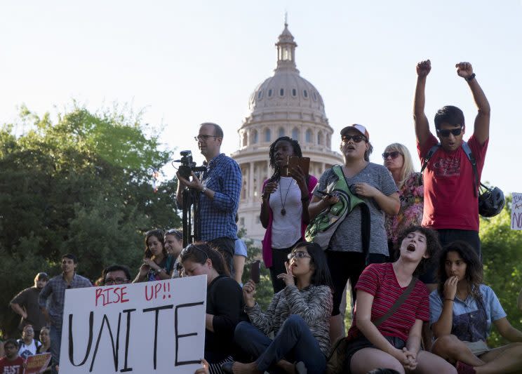 Protesters rally against the sanctuary cities ban in Austin, Texas