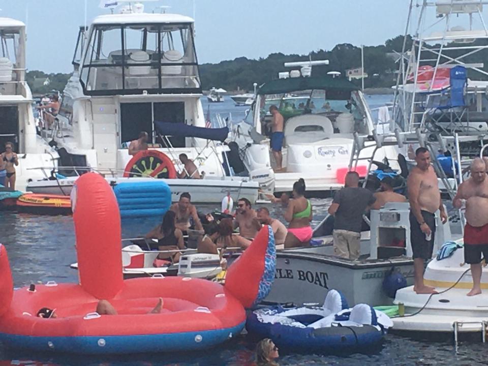 Boaters gather in Potters Cove off Prudence Island for the annual Aquapalooza in 2020.