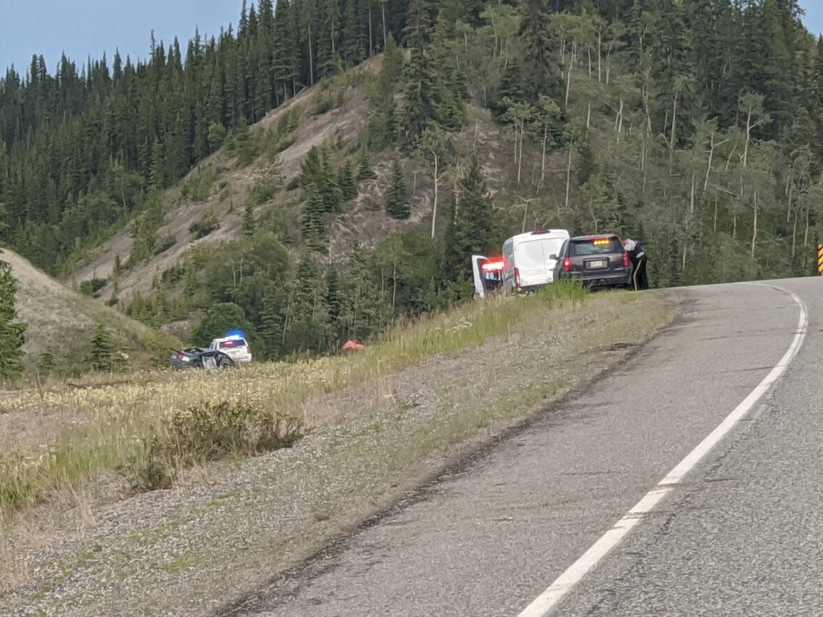 Investigators believe a car veered across the centre line of the Alaska Highway before striking an oncoming motorcyclist in Sunday's fatal crash.  (Steve Silva/CBC - image credit)