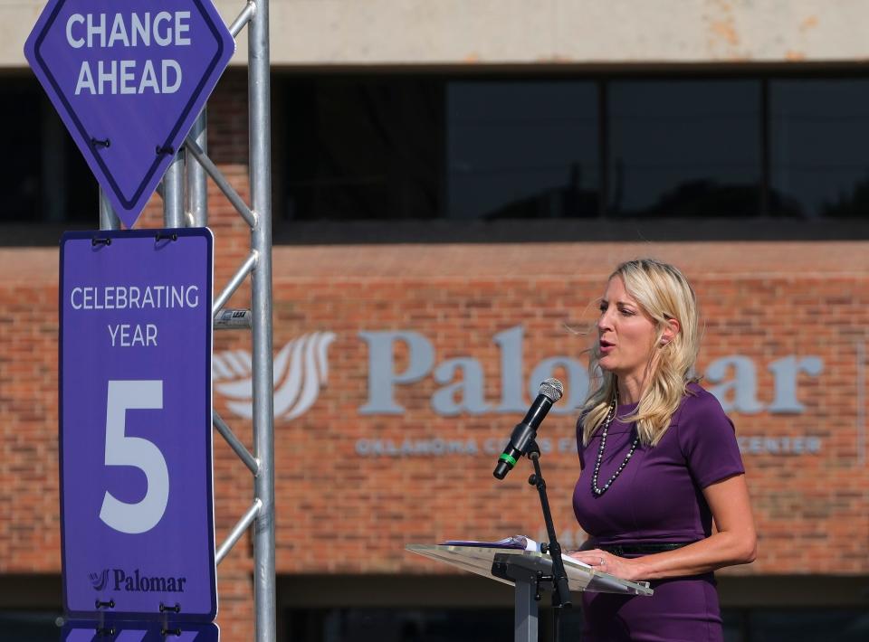 Kim Garrett, founder and chief visionary officer at Palomar, handled the emcee duties for Palomar's celebration of its "5 years of Changing Lives" event on Tuesday.
