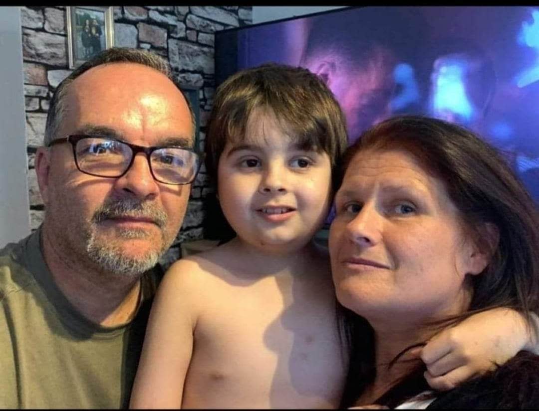 Mattheus Vieira with his parents Vitor Vieira and Maria Ferreira. (Family photo/ PA)