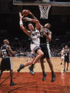 <p>2002: Tim Duncan #21 of the San Antonio Spurs blocks the shot by Pau Gasol #16 of the Memphis Grizzlies during the NBA game at The Pyramid on November 4, 2002 in Memphis, Tennessee. The Spurs defeated the Grizzlies 103 -101. </p>