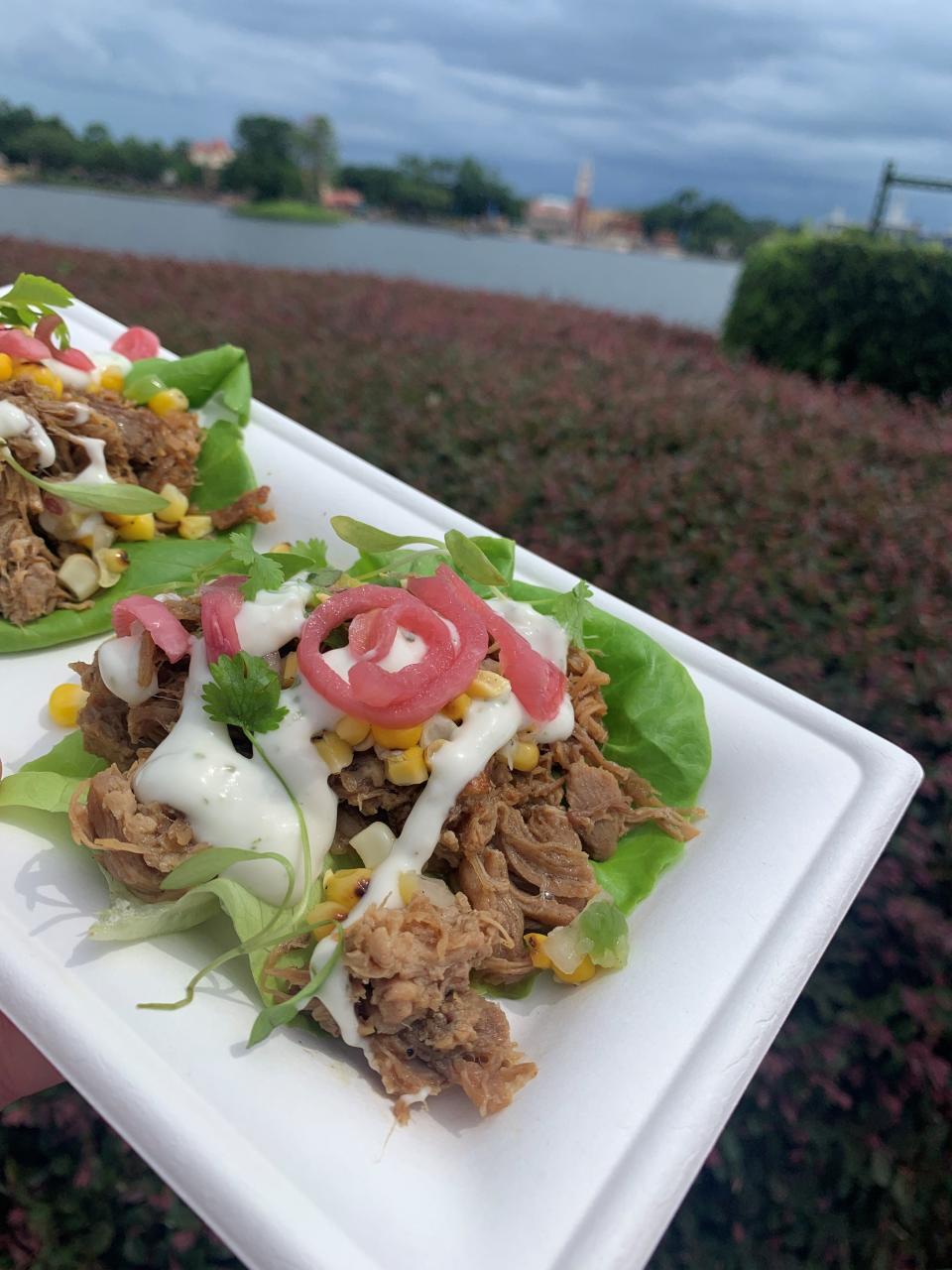 The grilled pork shoulder lettuce wrap at the Swanky Saucy Swine kitchen is one of the new offerings at the EPCOT International Food & Wine Festival.