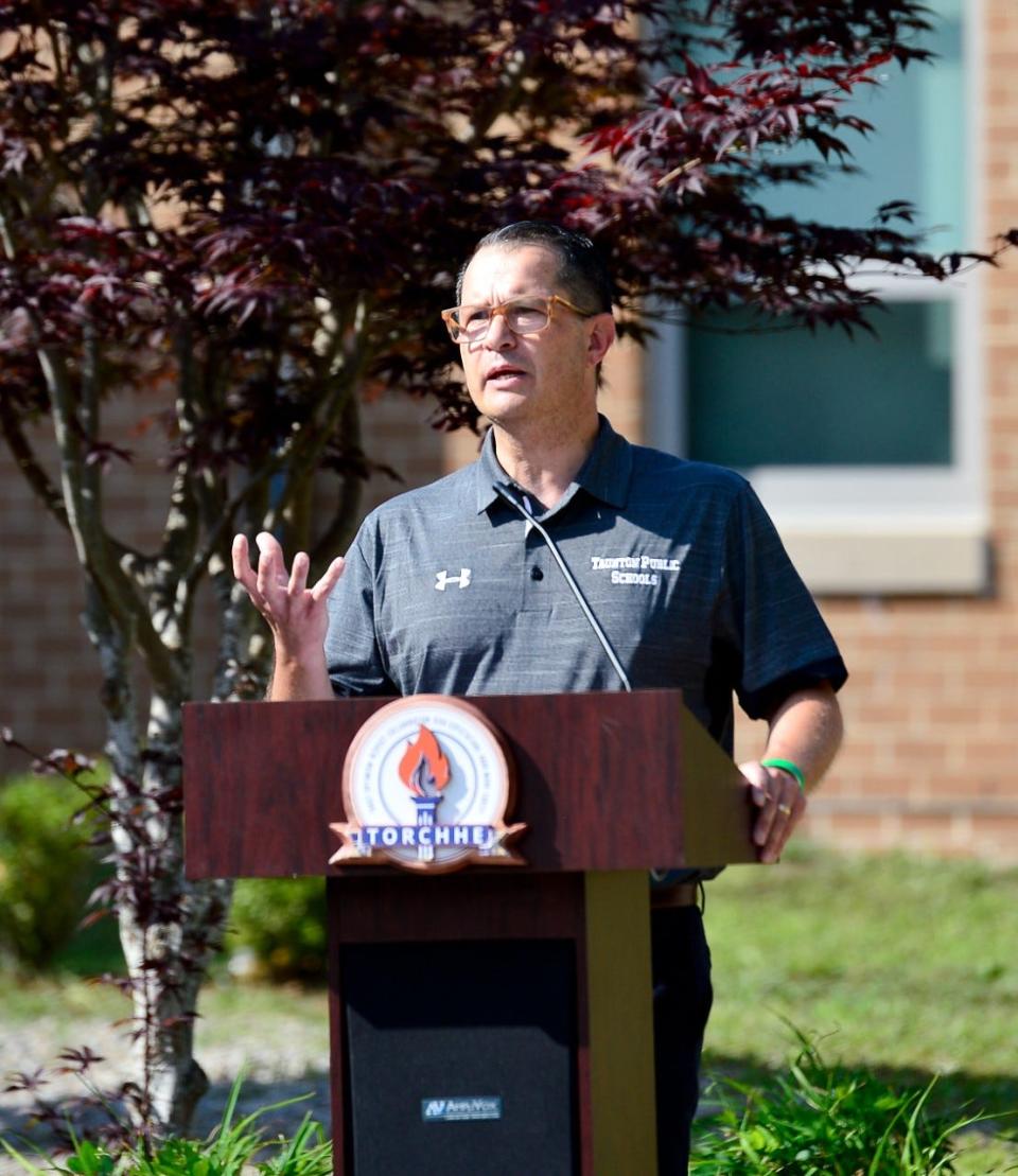 Superintendent of Taunton schools John Cabral speaks to the gathering at a BBQ buffet at Elizabeth E Pole School in this file photo.