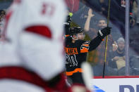 Philadelphia Flyers' Rasmus Ristolainen, right, reacts after scoring a goal during the second period of an NHL hockey game against the Carolina Hurricanes, Friday, Nov. 26, 2021, in Philadelphia. (AP Photo/Matt Slocum)