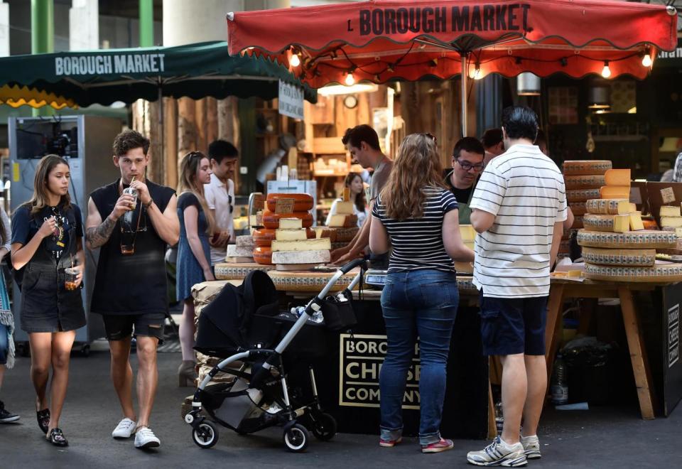 Shoppers returned to Borough Market after knife-wielding terrorist wreaked havoc (Reuters)