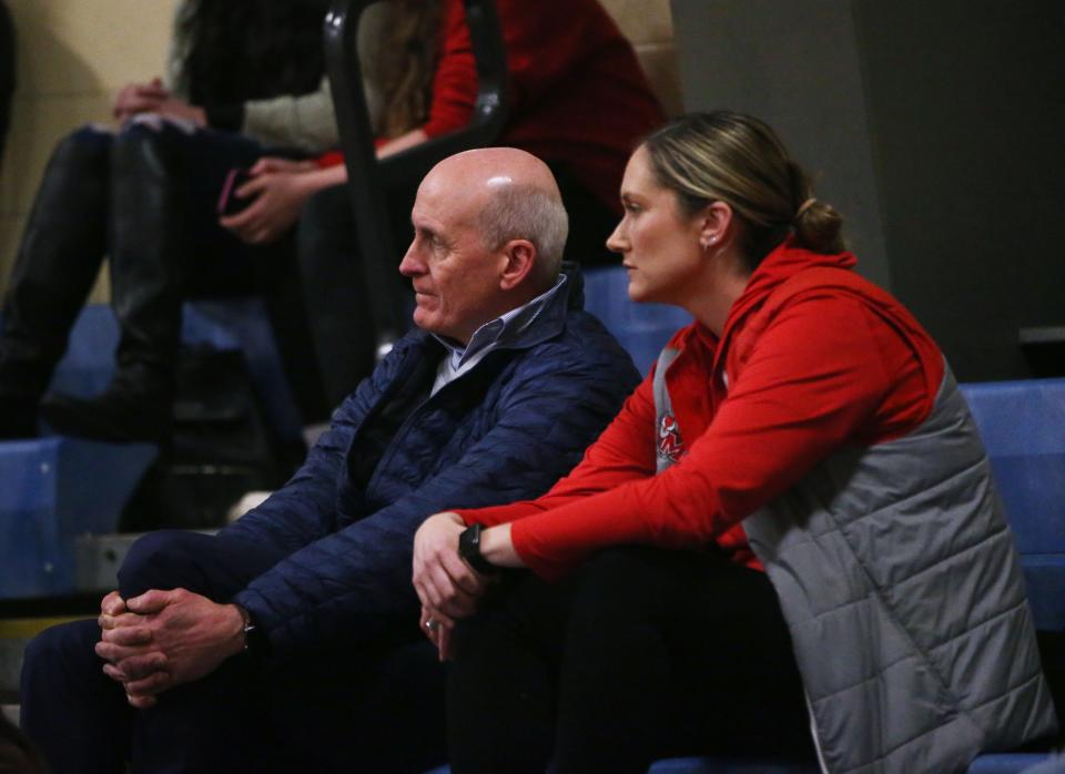 Marist College director of athletics Tim Murray and women's basketball assistant coach Erin Doughty watch the Section 1 Class AA girls basketball semifinal between Roy C. Ketcham and Our Lady of Lourdes on March 3, 2022.