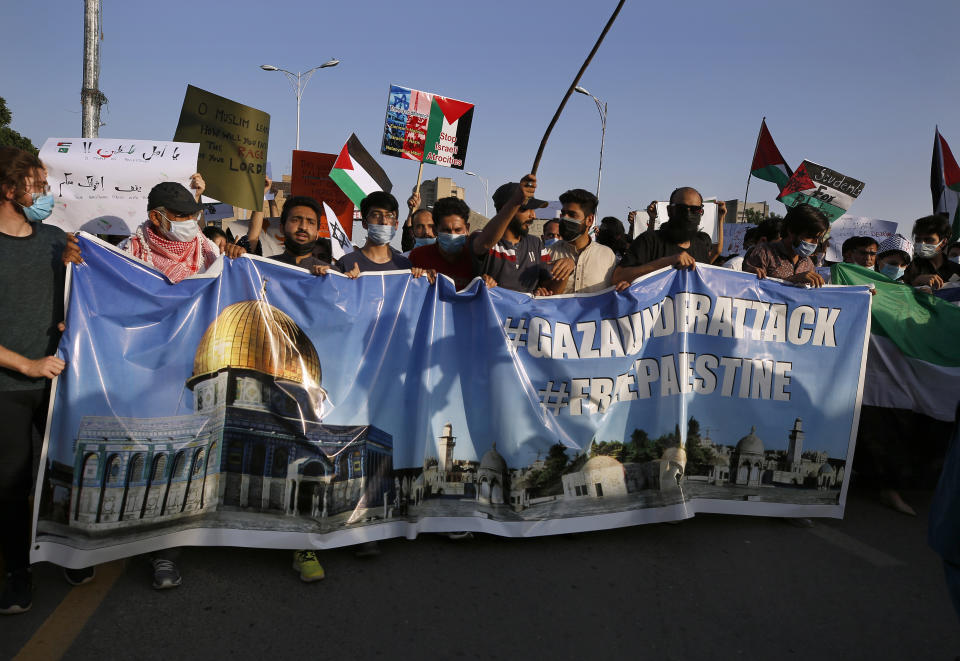People take part in a rally in support of Palestinians organized by civil society organizations, in Islamabad, Pakistan, Monday, May 17, 2021. (AP Photo/Anjum Naveed)