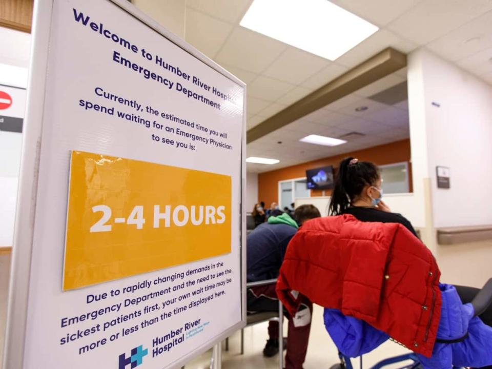 A sign indicates the estimated wait time at Humber River Hospital's emergency department in Toronto on April 26, 2022. The hospital is facing higher patient volumes and a rise in flu cases. (Alex Lupul/CBC - image credit)