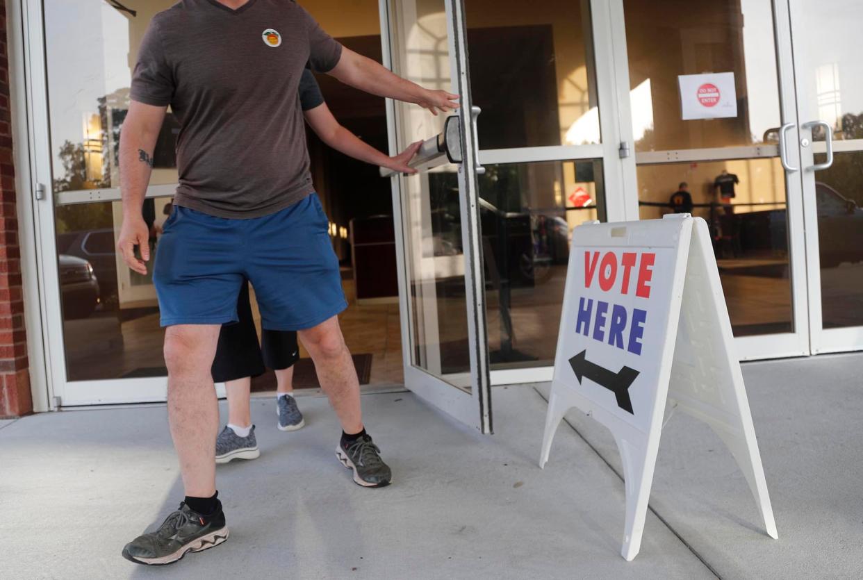 Voters leave the polling location at Coastal Cathedral Church pf God in Savannah after casting their ballots on Tuesday May 24, 2022 in the Georgia primary.