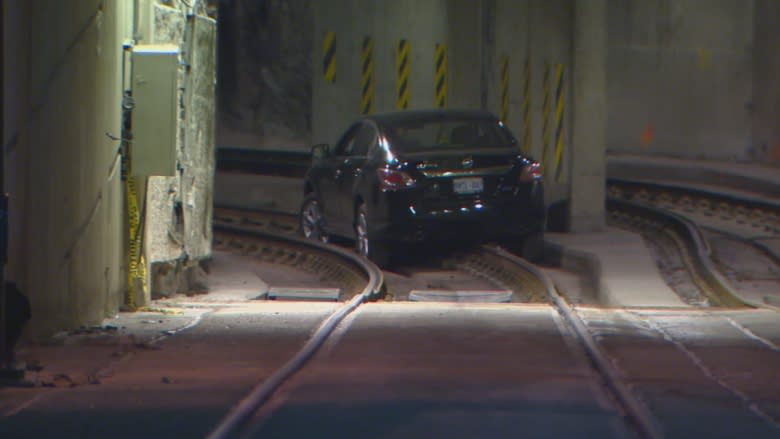 Car gets stuck after driving into TTC's Queens Quay tunnel