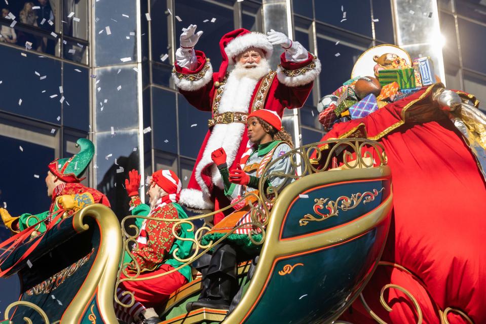 Santa Claus and Mrs Claus in a sleigh float along Central Park West during the Macy's Thanksgiving Day parade, Thursday, Nov. 23, 2023, in New York.