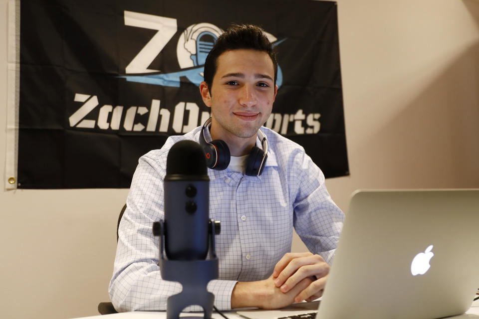 Zach Gershman, a Penn State sophomore, poses for a photograph in his basement studio, Thursday, Aug. 6, 2020, in Philadelphia. Gershman lost a paid summer internship covering The Northwoods collegiate baseball league for local Fox Sports affiliates in the Midwest. (AP Photo/Matt Slocum)