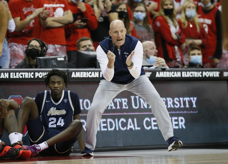 Akron Zips head coach John Groce yells from the bench during the second half of the NCAA men's basketball game against the Ohio State Buckeyes at Value City Arena in Columbus on Tuesday, Nov. 9, 2021. The Buckeyes won 67-66.