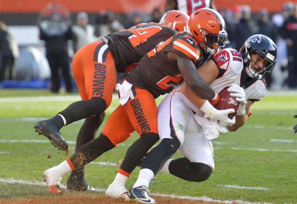 <p>Atlanta Falcons tight end Austin Hooper (81) catches a pass for a three-yard touchdown in the second half of an NFL football game against the Cleveland Browns, Sunday, Nov. 11, 2018, in Cleveland. (AP Photo/David Richard) </p>