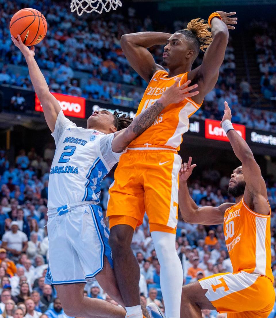 North Carolina’s Elliot Cadeau (2) drives against Tennessee’s Jahmai Mashack (15) in the first half on Wednesday, November 29, 2023 at the Smith Center in Chapel Hill, N.C.