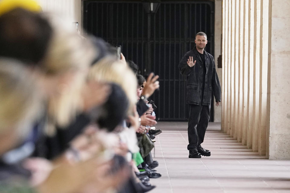 Designer Matthew M. Williams gestures after presentation a creation for Givenchy Menswear Spring/Summer 2024 fashion collection in Paris, Thursday, June 22, 2023. (AP Photo/Michel Euler)