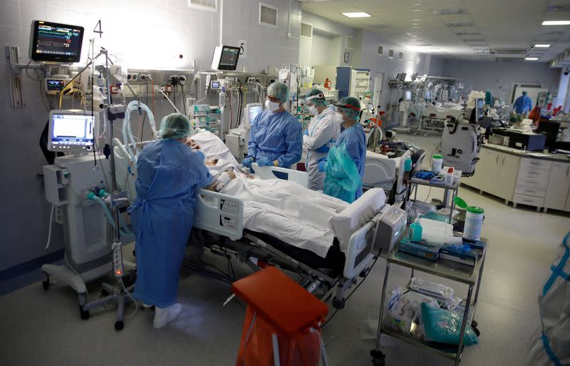 Medical staff members treat patients inside the coronavirus disease (COVID-19) ward at the Hospital of the Ministry of Interior and Administration in Warsaw