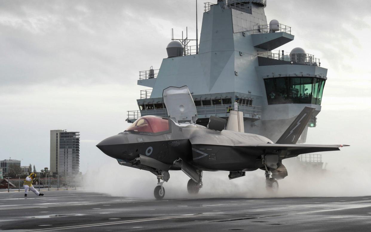 An F-35B fighter jet prepares to take off from an aircraft carrier - Belinda Aker/PA