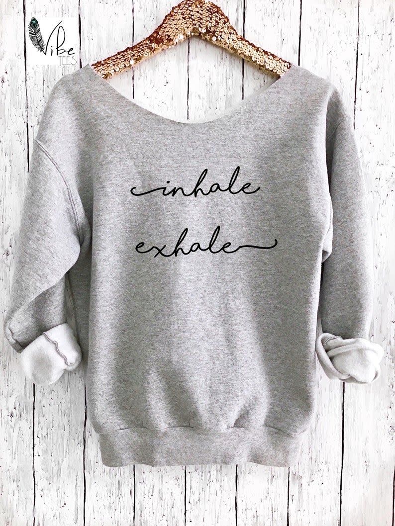 2) Inhale Exhale Off-Shoulder Yoga Sweater