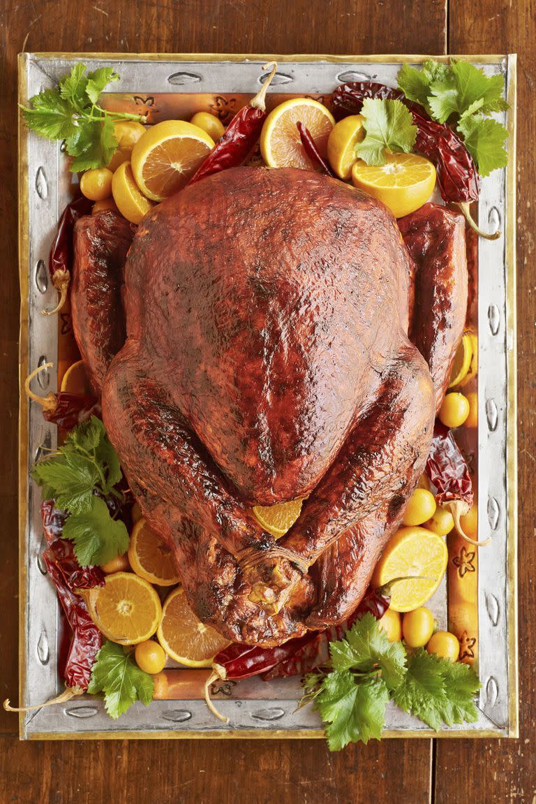 <p>Give your Thanksgiving feast a Southwestern kick with this spicy-meets-sweet glazed turkey.</p><p>Get the <a href="https://www.countryliving.com/food-drinks/recipes/a45298/red-chile-and-orange-glazed-turkey-recipe/" rel="nofollow noopener" target="_blank" data-ylk="slk:Red Chile and Orange-Glazed Turkey recipe" class="link "><strong>Red Chile and Orange-Glazed Turkey recipe</strong></a> from Country Living.</p>