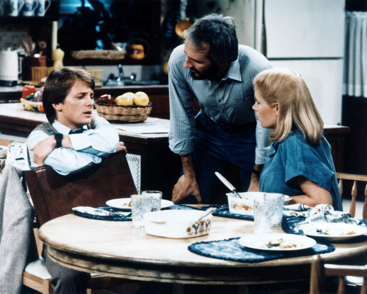 Alex P. Keaton at the dinner table with his parents, Steven and Elyse.