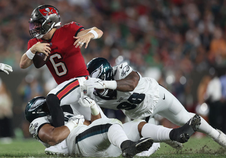 Philadelphia Eagles defensive lineman Marlon Tuipulotu (95) sacks Tampa Bay Buccaneers quarterback Baker Mayfield during Monday night's game. (Photo by Mike Carlson/Getty Images)