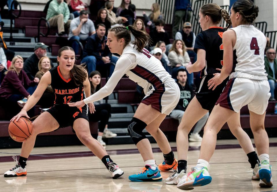 Marlborough High School senior captain Liz Johnson with the ball at Westborough, Jan. 12, 2024.