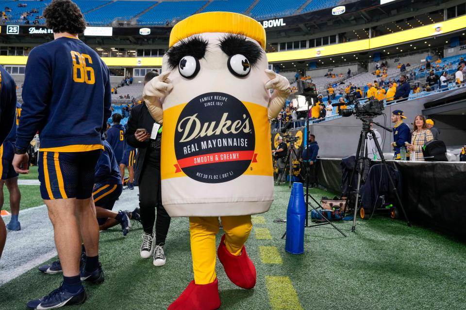 Official Mayo Bowl mascot during pregame warm ups between the North Carolina Tar Heels and the West Virginia Mountaineers at Bank of America Stadium.