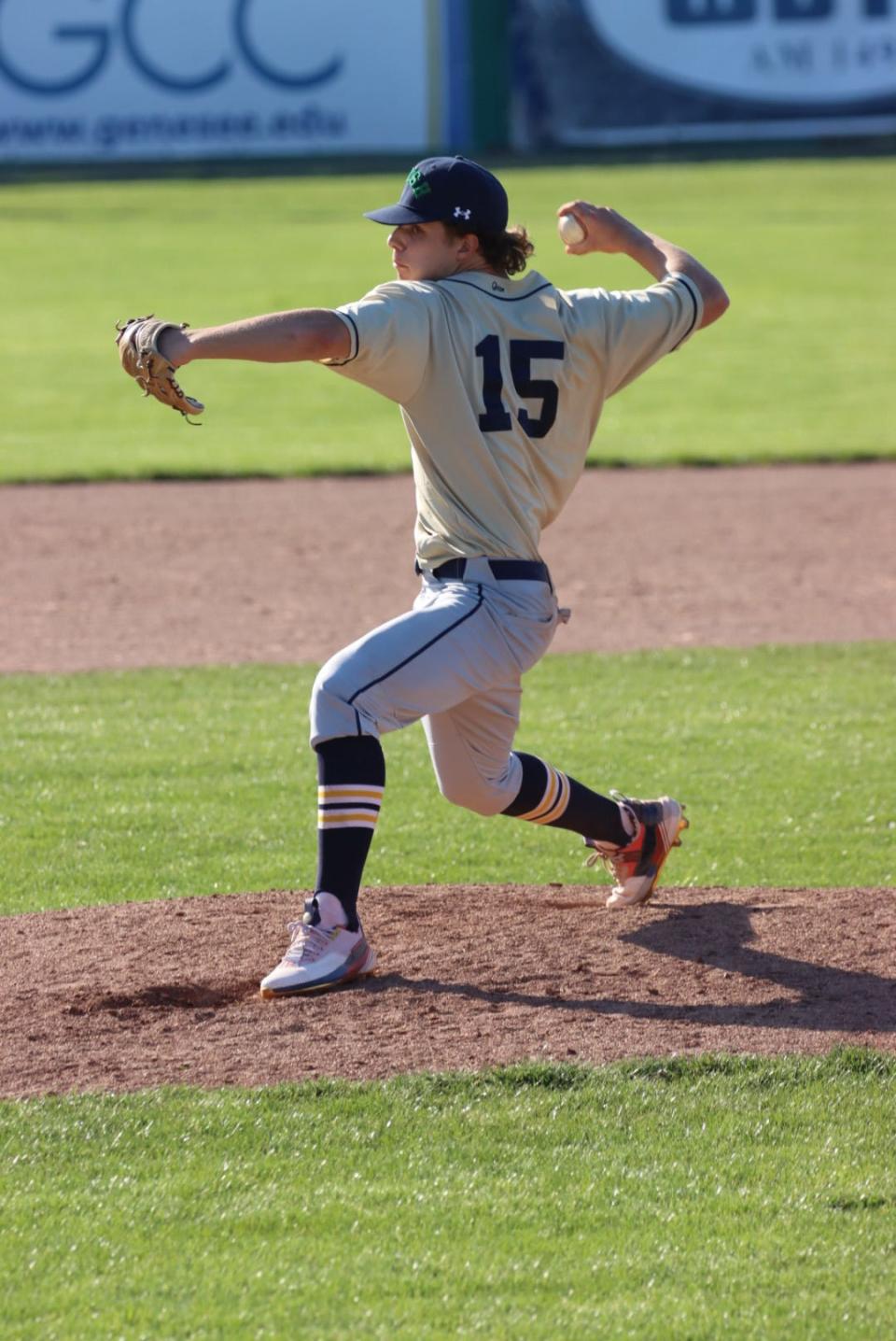 Bryceton Berry, a senior on the Batavia Notre Dame team, pitching against Albion during the 2023 season.